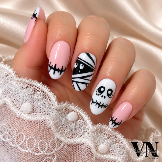 Press on nails Funny Momies rose et blanc avec motifs momies et coutures noires, manucure Halloween faite main