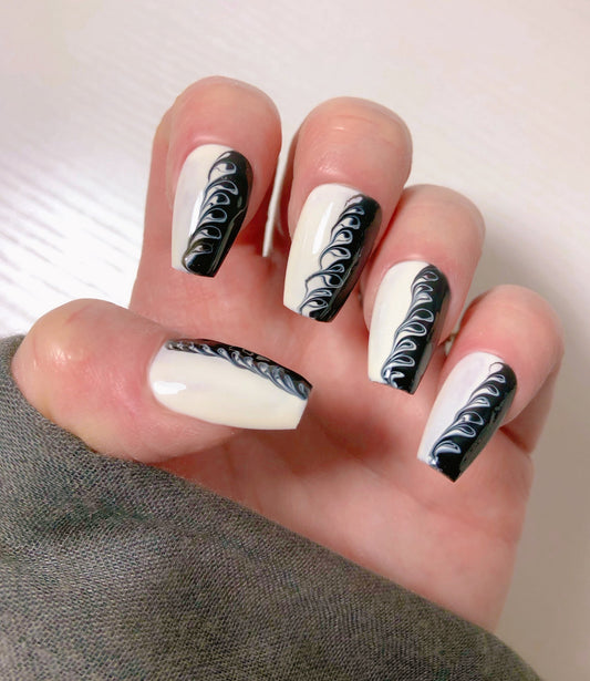 faux-ongles-noir-et-blanc-tourbillon-1