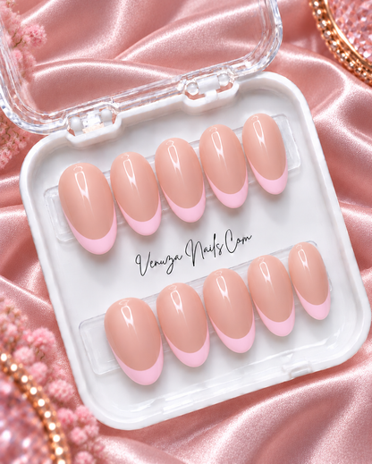 Ongles press-on ovales nude avec French manucure rose clair, longueur medium, Venuza Nails