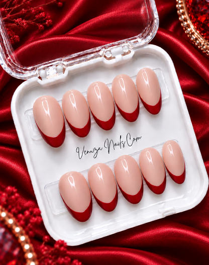 Ongles press-on ovales nude avec French manucure rouge, longueur medium, Venuza Nails